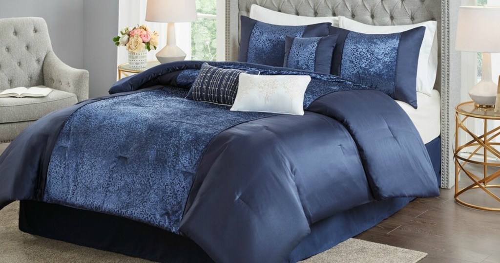 bed with blue comforter