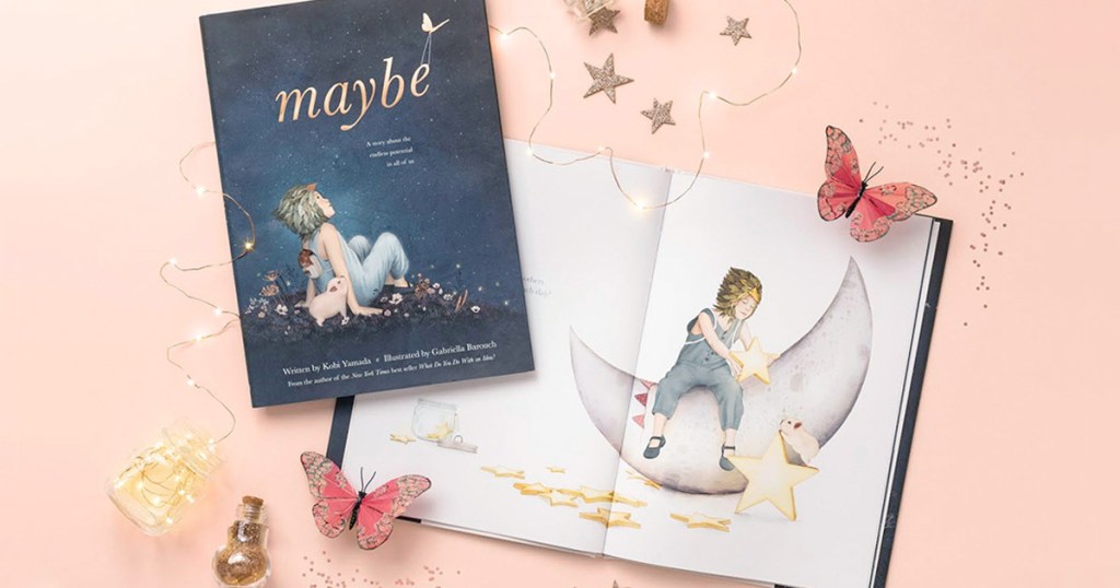cover for the children's book maybe and book opened on a pink background with gold stars around it