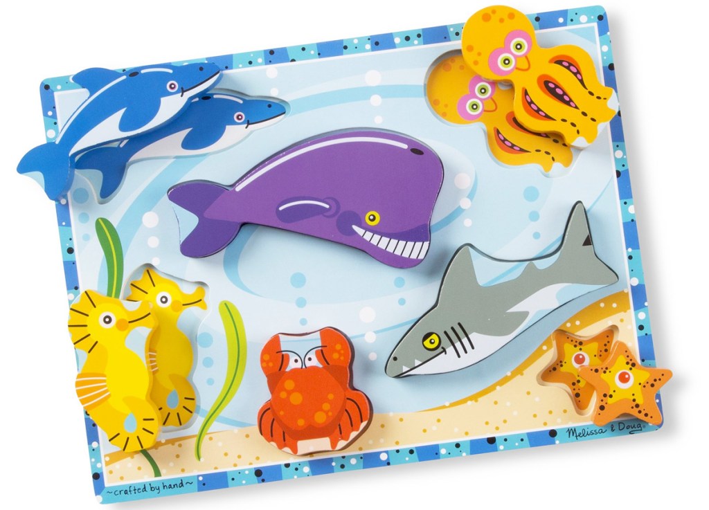 wooden toddler puzzle with sea creature shaped puzzle pieces