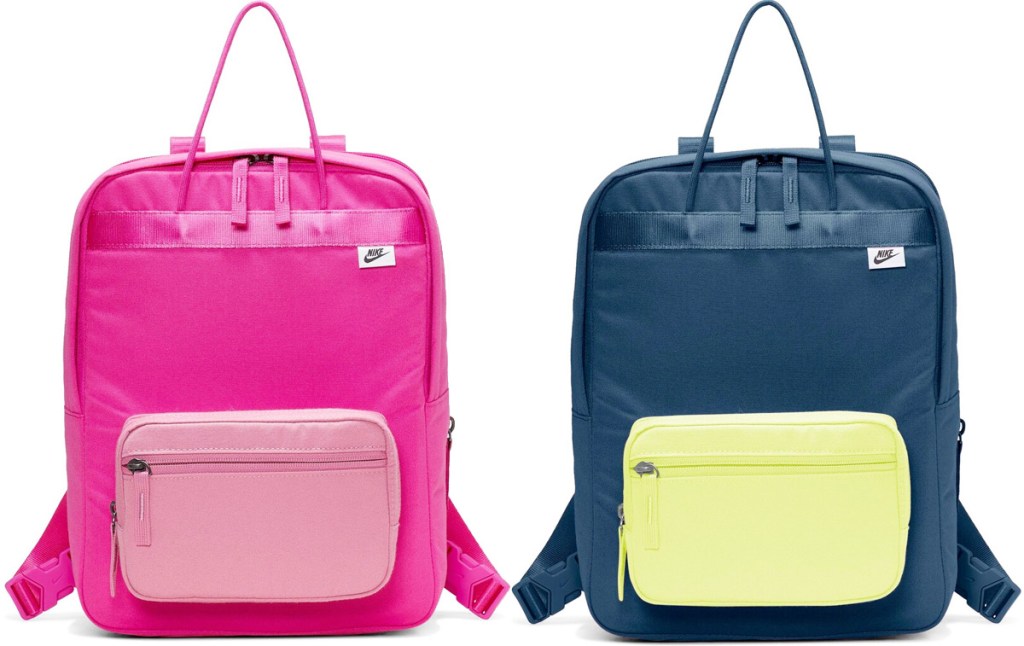 two Nike brand backpacks in pink with light pink front pocket and blue with light yellow front pocket