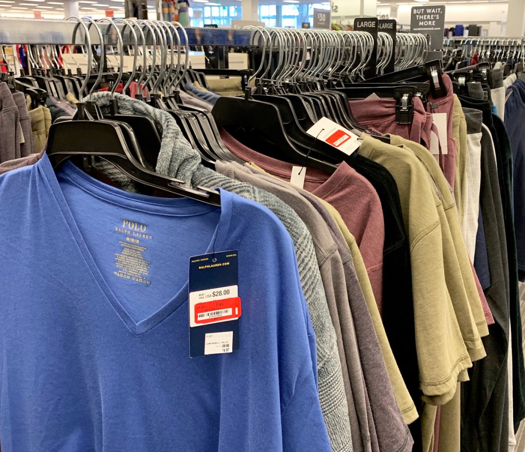 mens tshirts on black hangers on store display rack