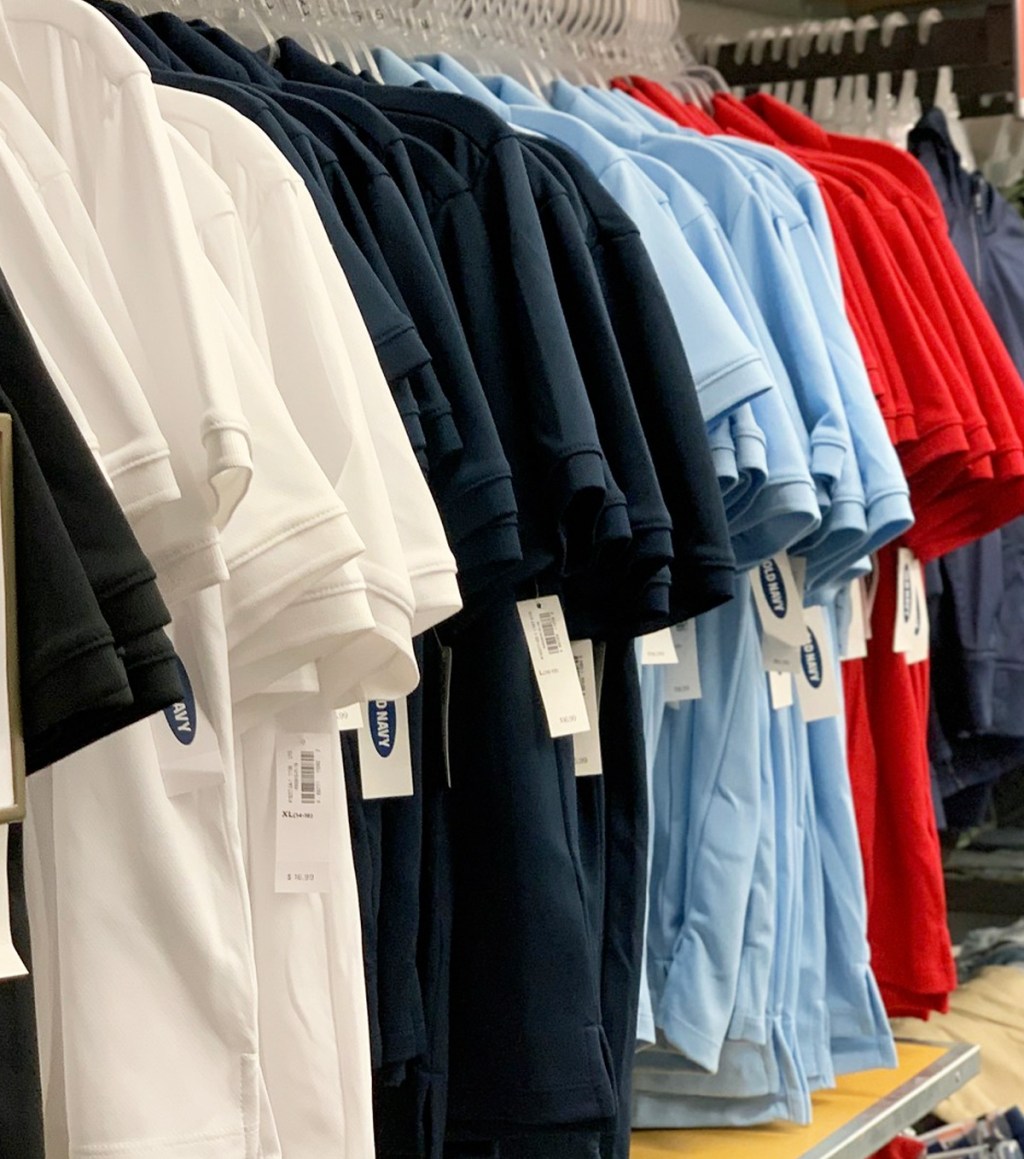 store display rack with polo shirt on hangers