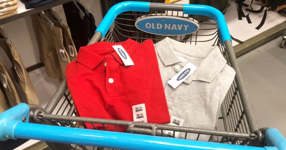 folded red and light grey polo shirts in blue old navy shopping cart