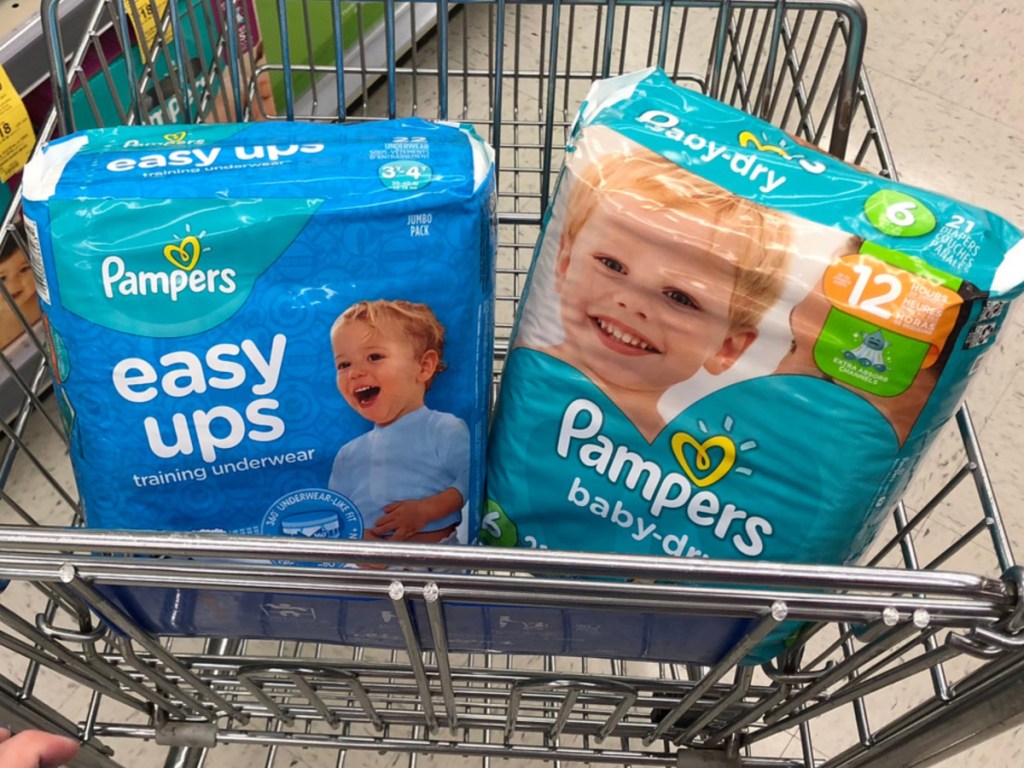 pampers diapers sitting in store shopping cart 
