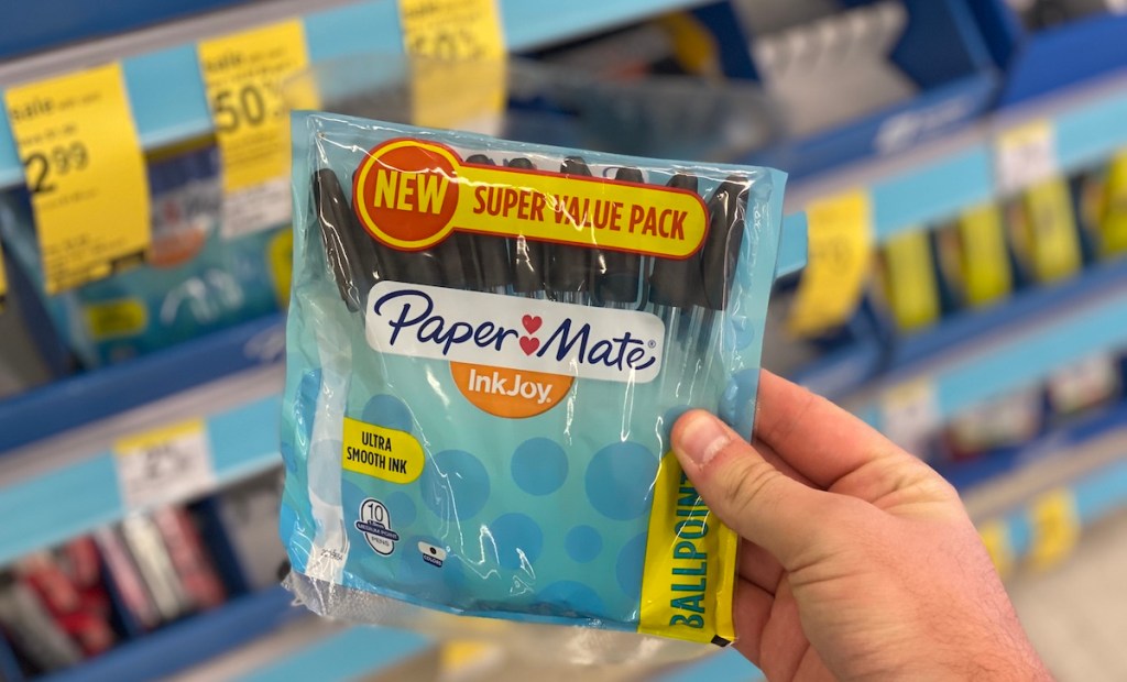 hand holding package of Paper Mate pens