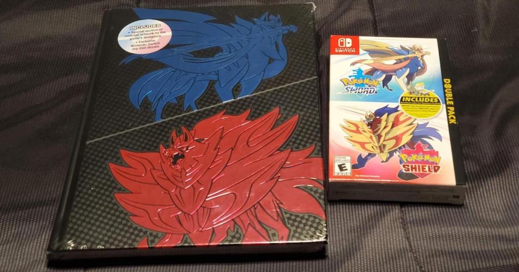 pokemon sword and sheild strategy guide next to game