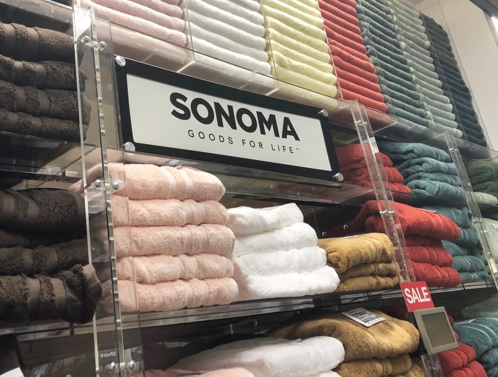 store display of sonoma bath towels in various colors