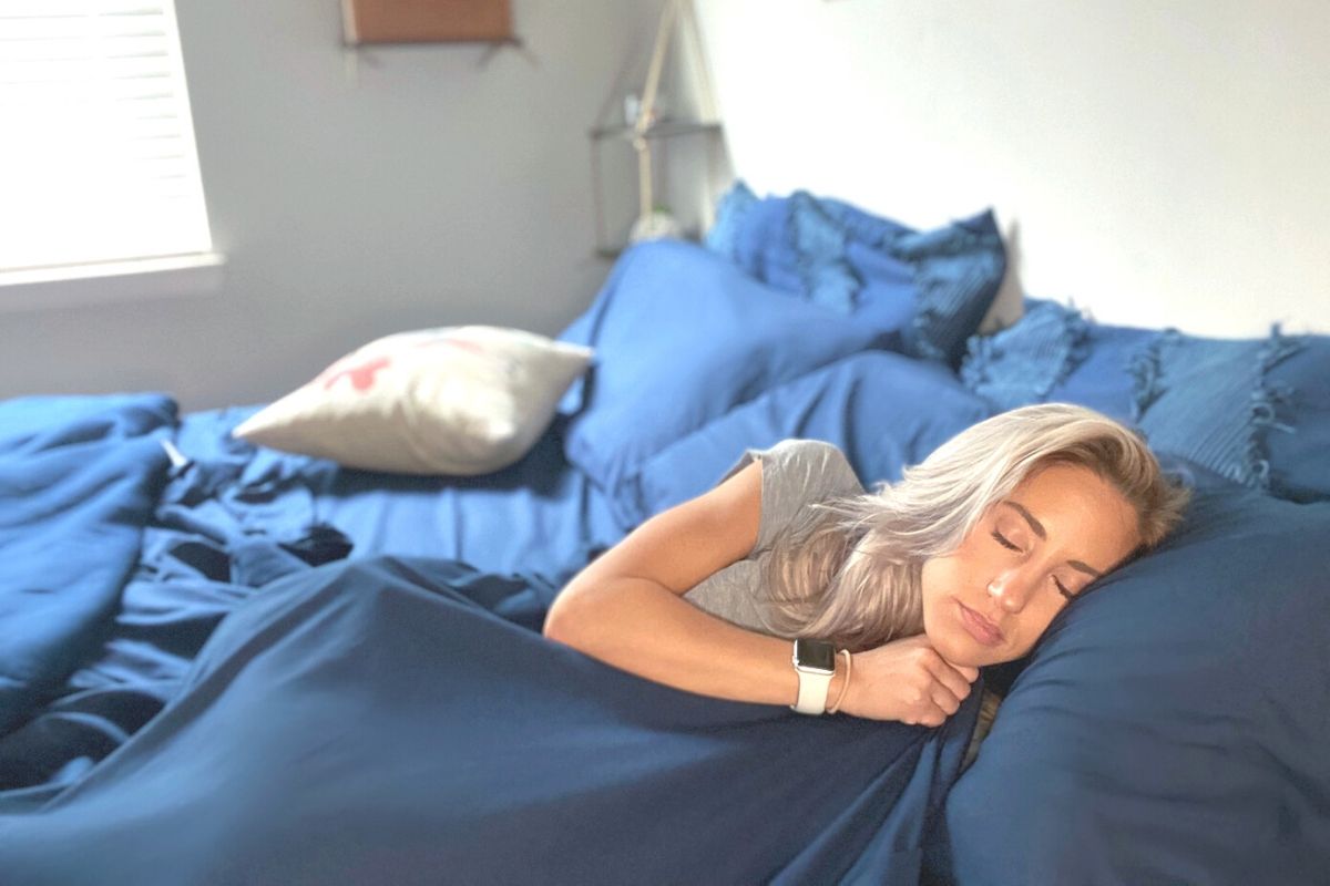 A woman sleeping in bed