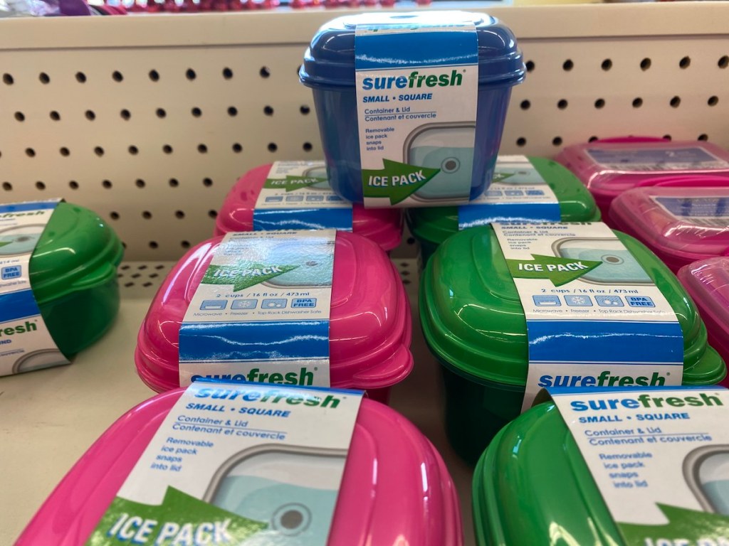 blue, pink, and green Sure Fresh Small Square Container, Lid, & Ice Pack Combo on shelf at dollar tree