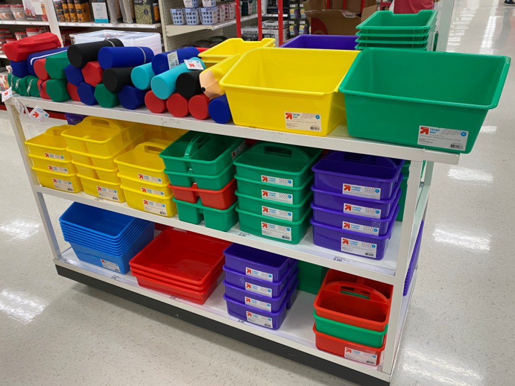 various colorful school supplies on shelves in store