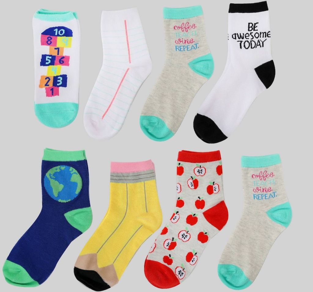 eight pairs of teacher themed socks