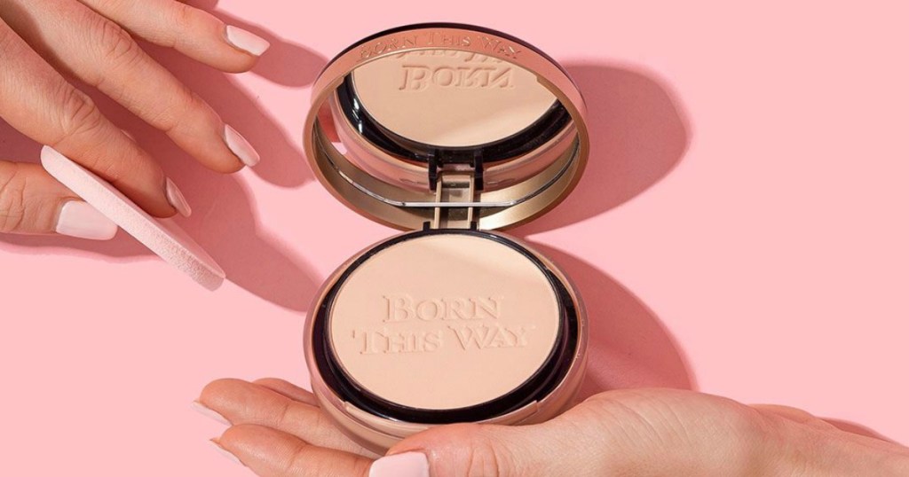 Too Faced born this way powder foundation in hand