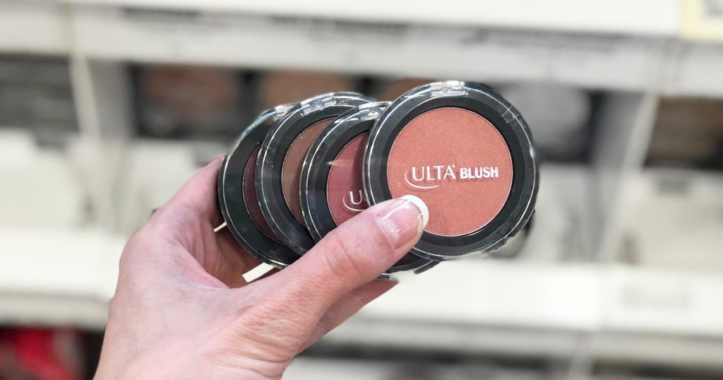 person holding up multiple round ulta brand blushes
