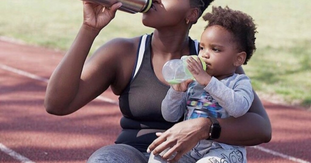 takeya kids tritan water bottle kid drinking with mom