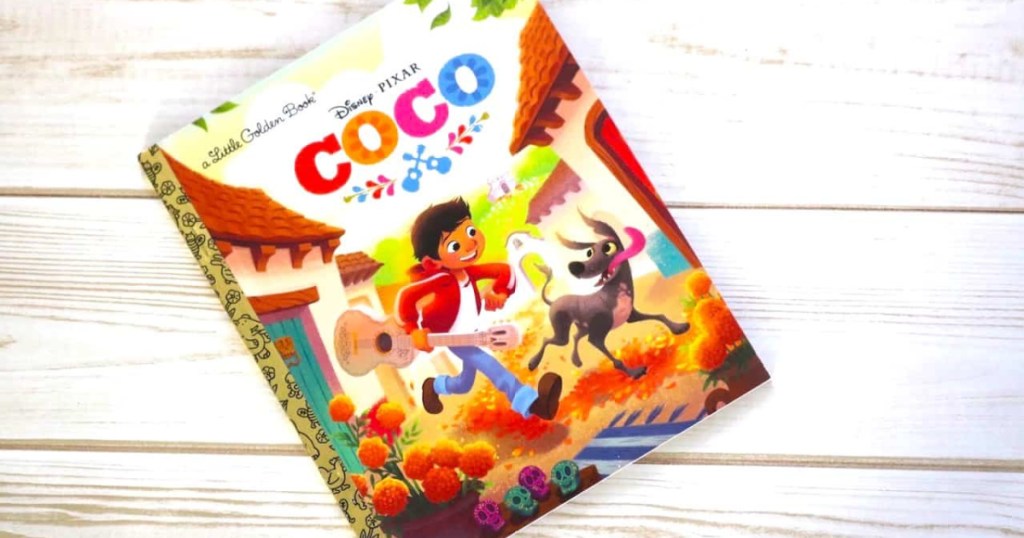 coco little golden book on wood background