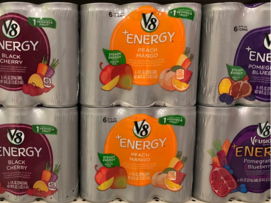packs of fruit/veggie energy drink cans on store shelf