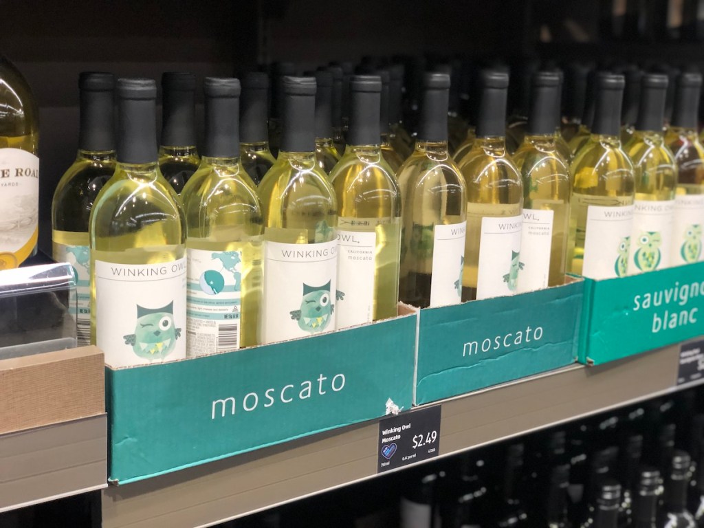 aldi shelf with bottles of Winking Owl Moscato