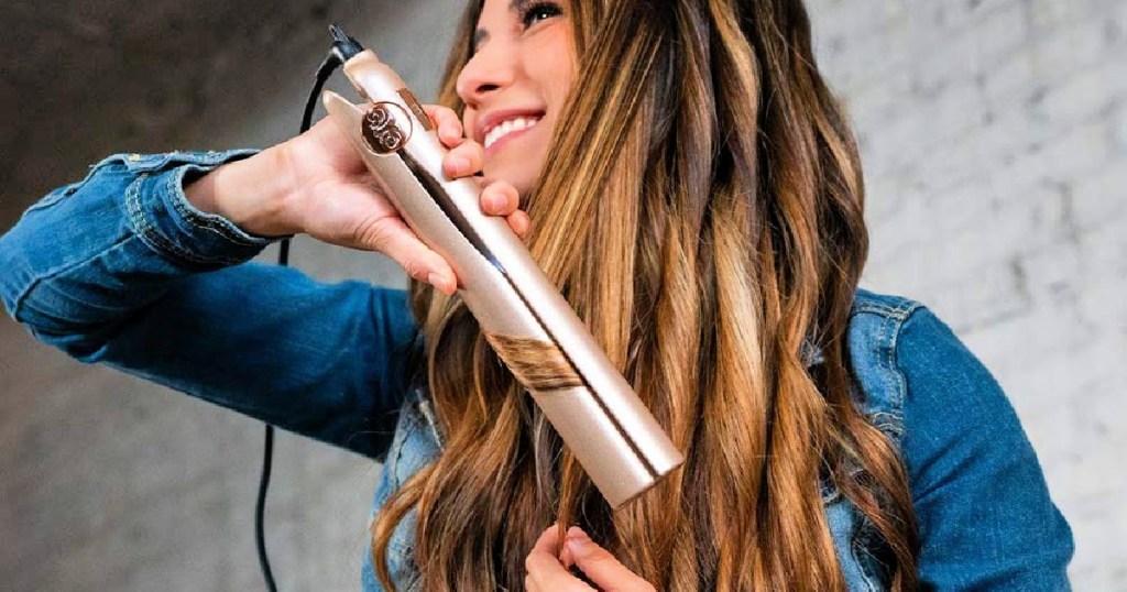Woman using a Tyme Pro Iron on her hair2