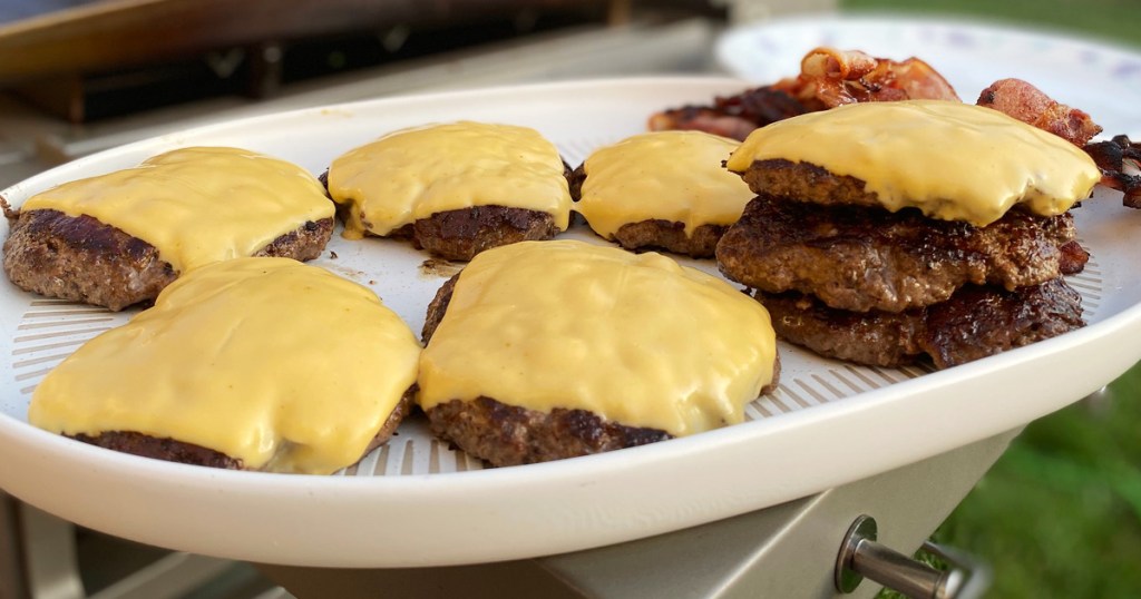 grilled cheeseburgers on a platter