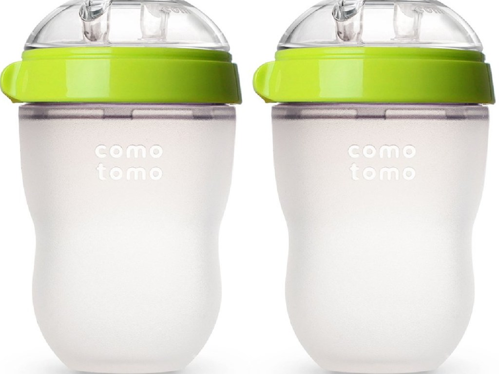 2 baby bottles with green caps on white background