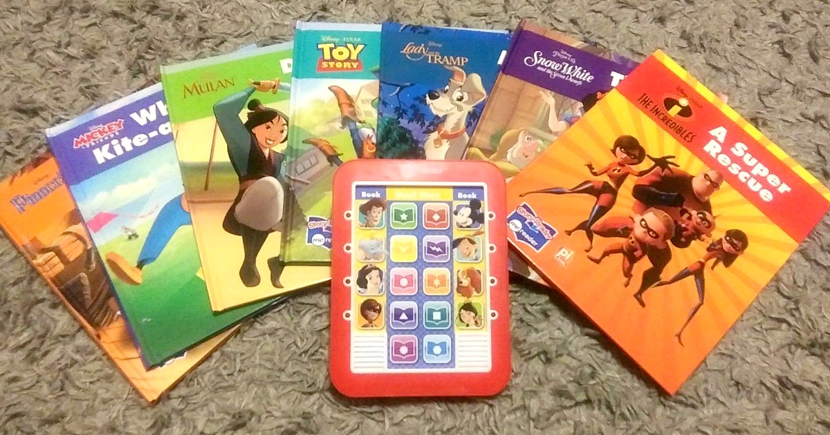 kids ereader with collection of Disney books on the floor