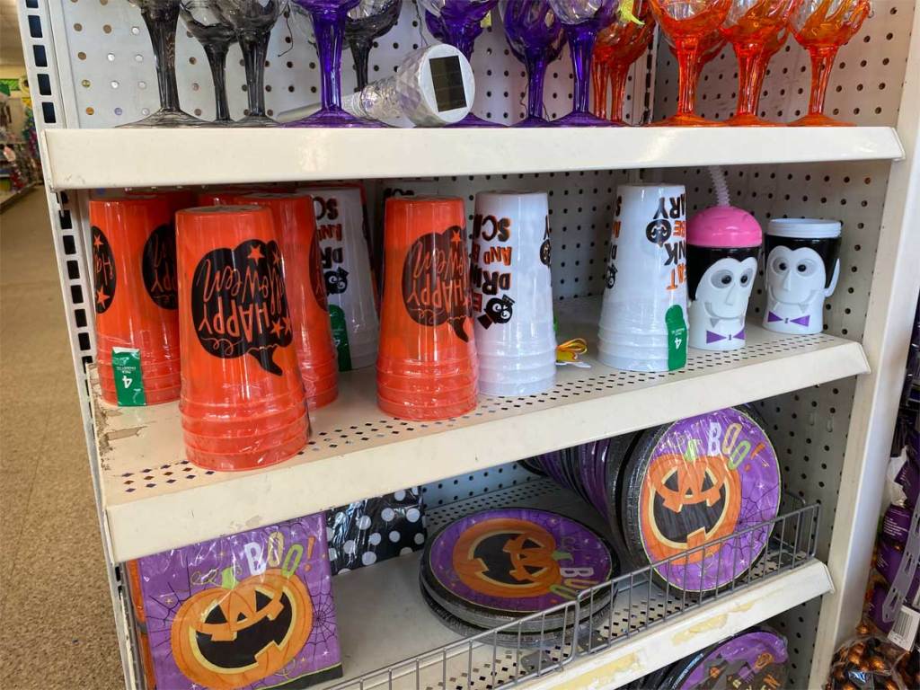 halloween drinkware and plates on display in store