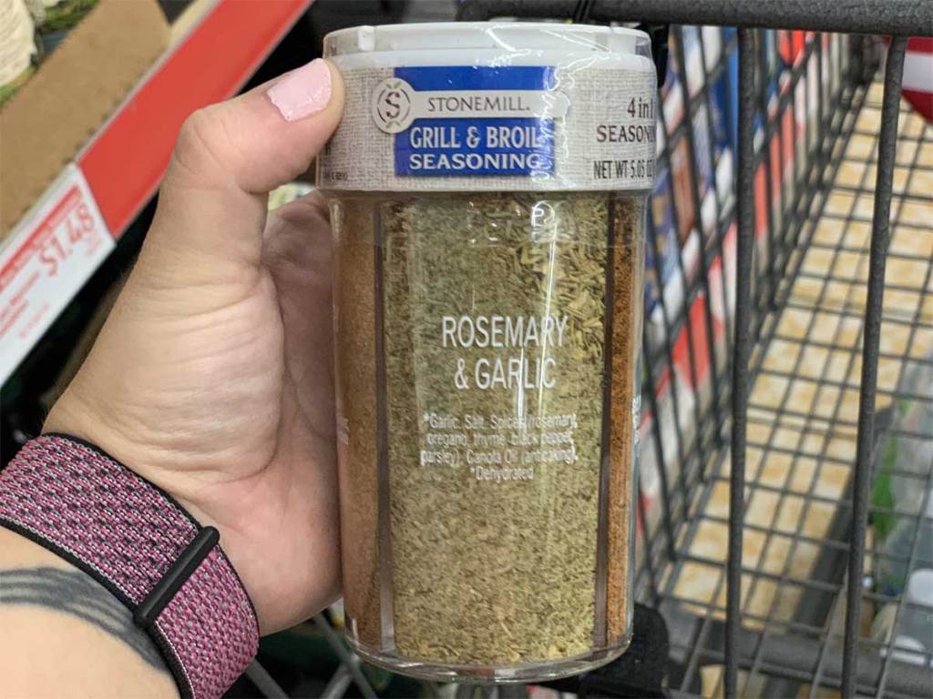 hand holding grill and broil seasoning