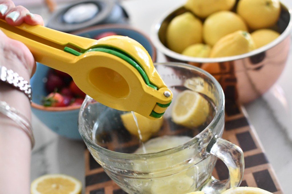 juicing lemons with a hand juicer