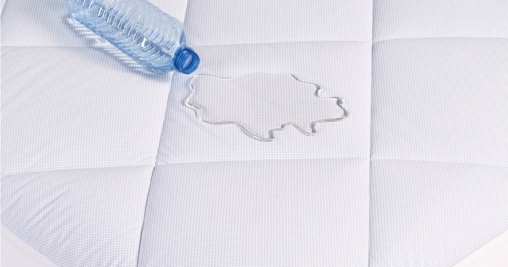 martha stewart cool to touch mattress pad with water bottle spill