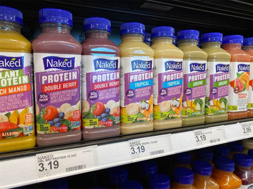 shelf of naked protein smoothies on a shelf in a store
