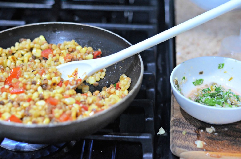 pan on stovetop with corn