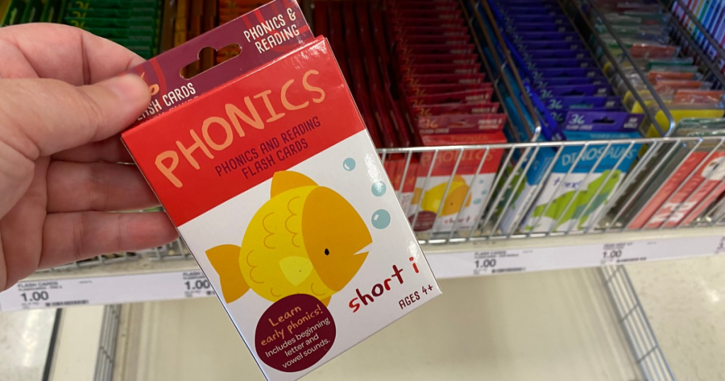 hand holding up cards for phonic by store display