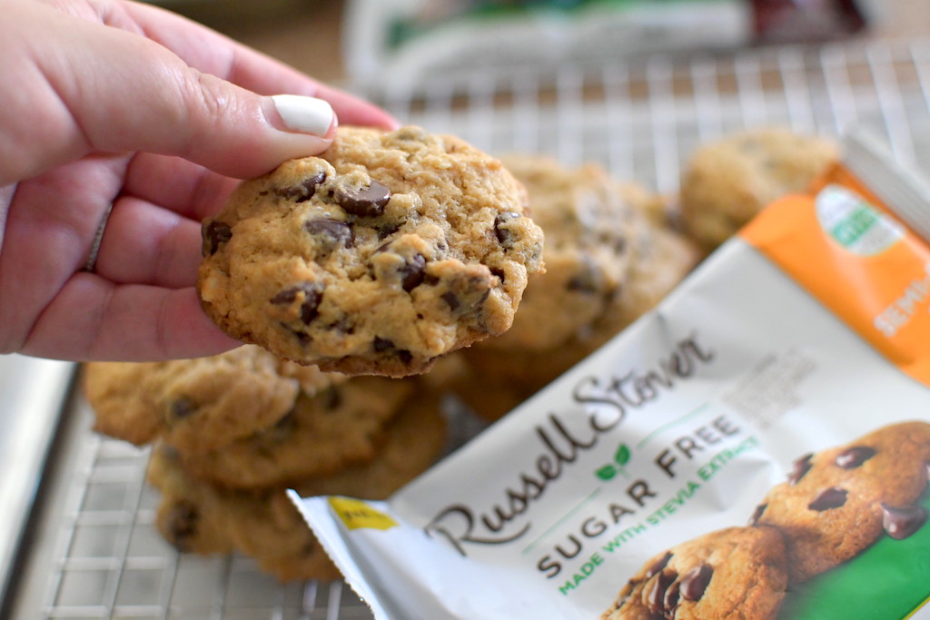 holding sugar-free russell stover chocolate chip cookie 