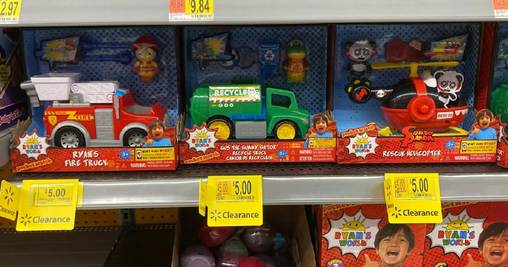 three toys on store shelf by clearance tags