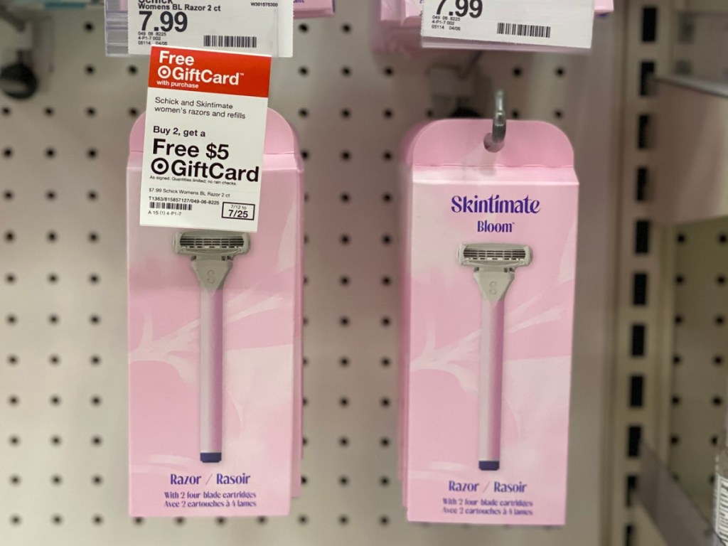2 skintimate bloom razor packages hanging nect to each other in store