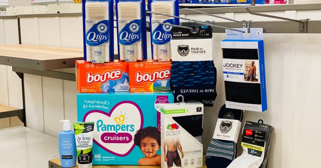 store with products in pile including diapers, q-tips and underwear