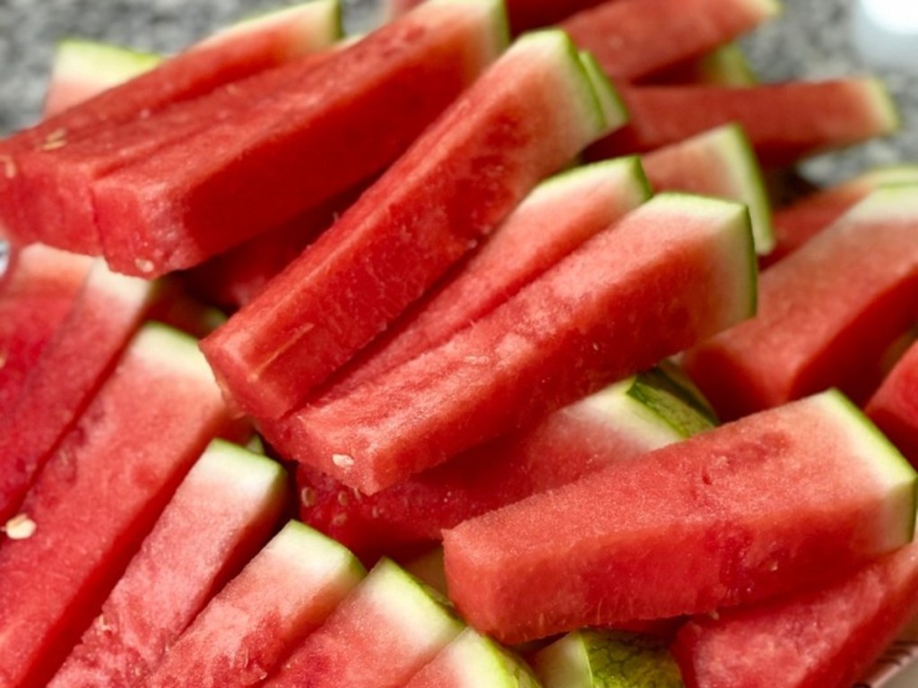 watermelon spears on a tray