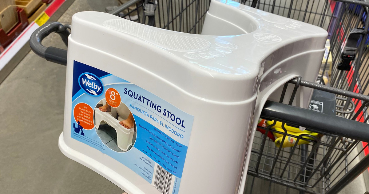 white plastic bathroom squatting stool on an ALDI shopping cart