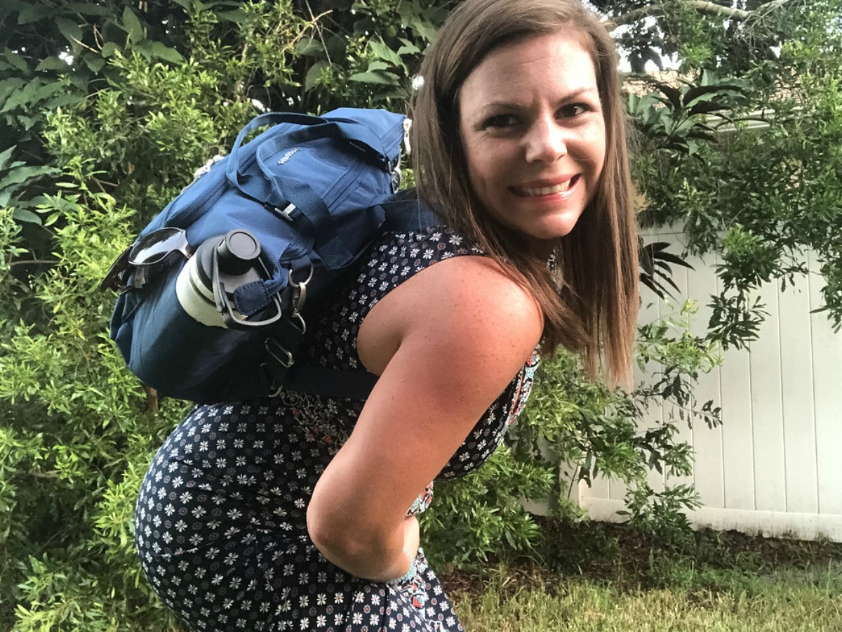 lady carrying a Baggallini bag on her back