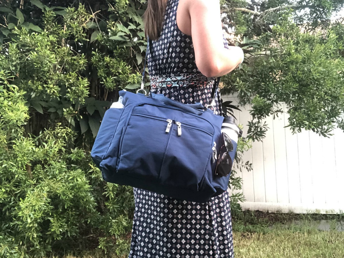 lady wearing a Baggallini bag as a crossbody option