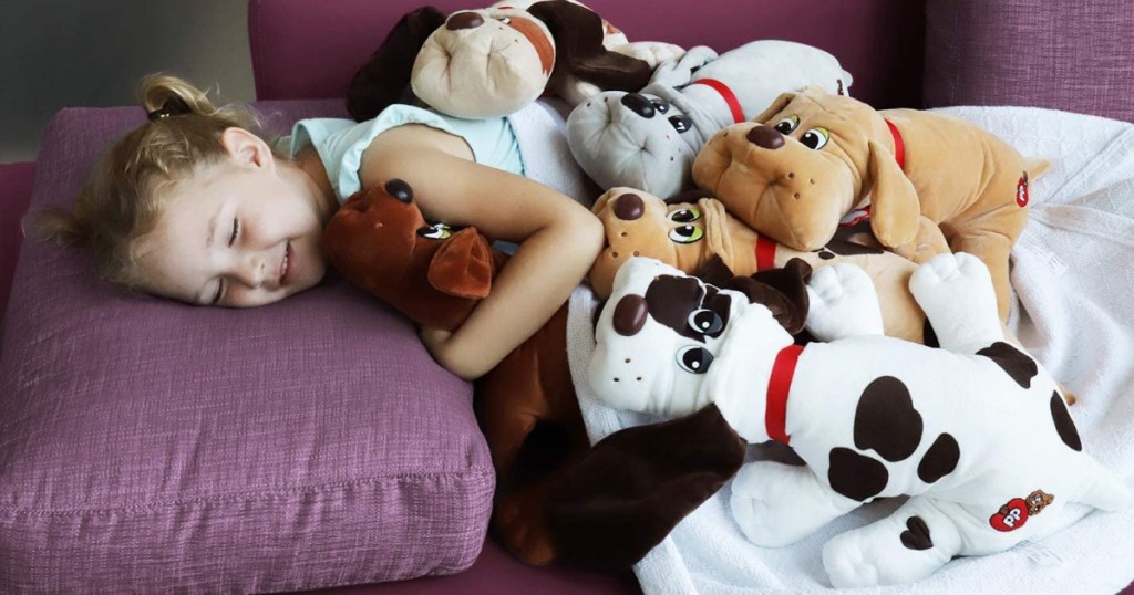 pound puppies toys girl laying down with pound puppies