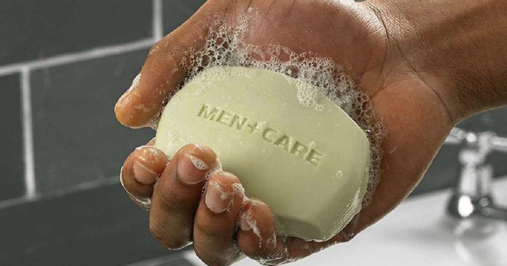 dove men + care bar soap in hand