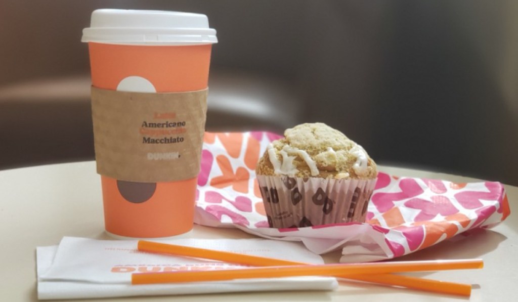 dunkin donuts coffee and snacks on table