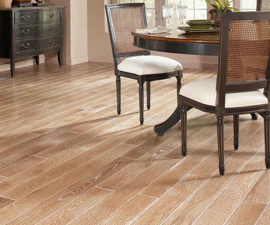 lightly stained hardwood flooring in dining room