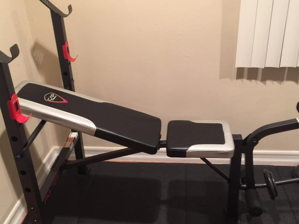 black and red strength bench in home