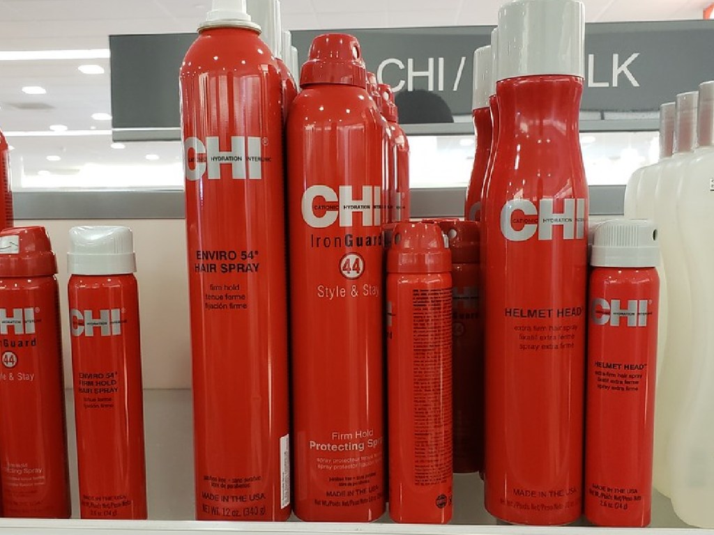 bottles of hairspray on store shelf