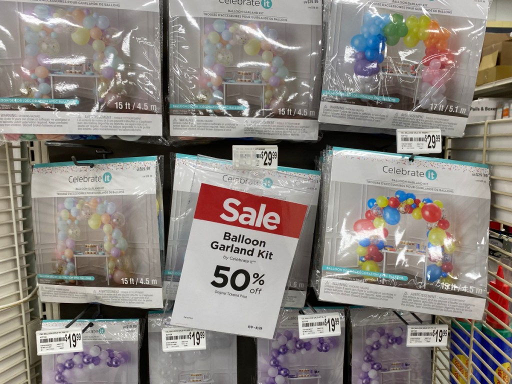 balloon garland kits hanging in store