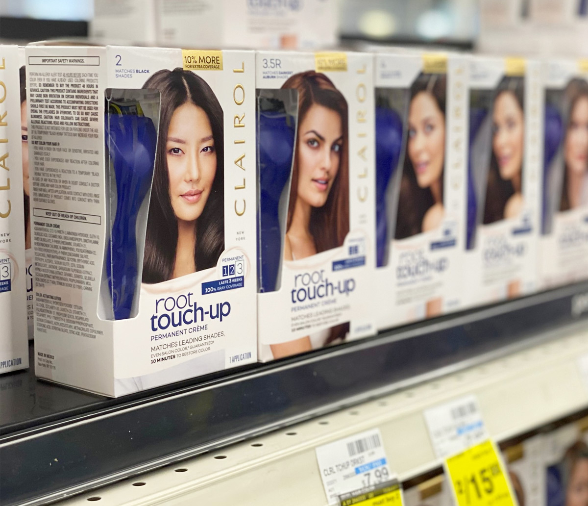 white boxes of Clairol Root Touch Up hair color on CVS shelf