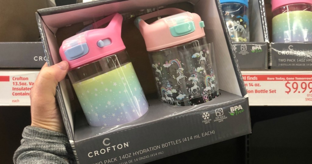 hand holding pack of Crofton Water Bottles
