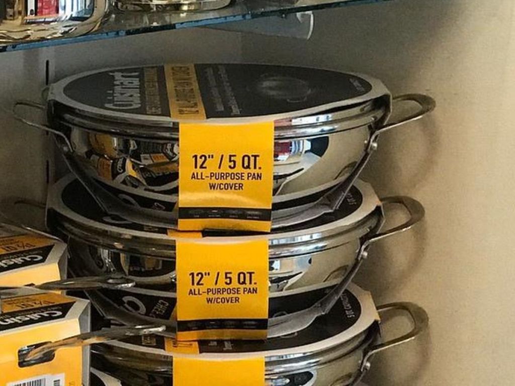 stack of stainless steel brand new pans